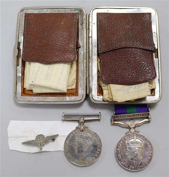 A GSM with Palestine bar, a WWII Victory medal and a Para badge and other ephemera